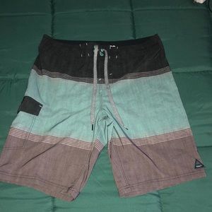 Trinity board shorts.